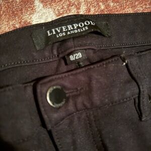 Liverpool woman Dark pants